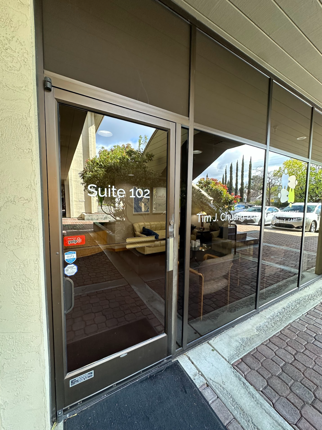 Family First Smile Care professional office exterior showing Suite 102